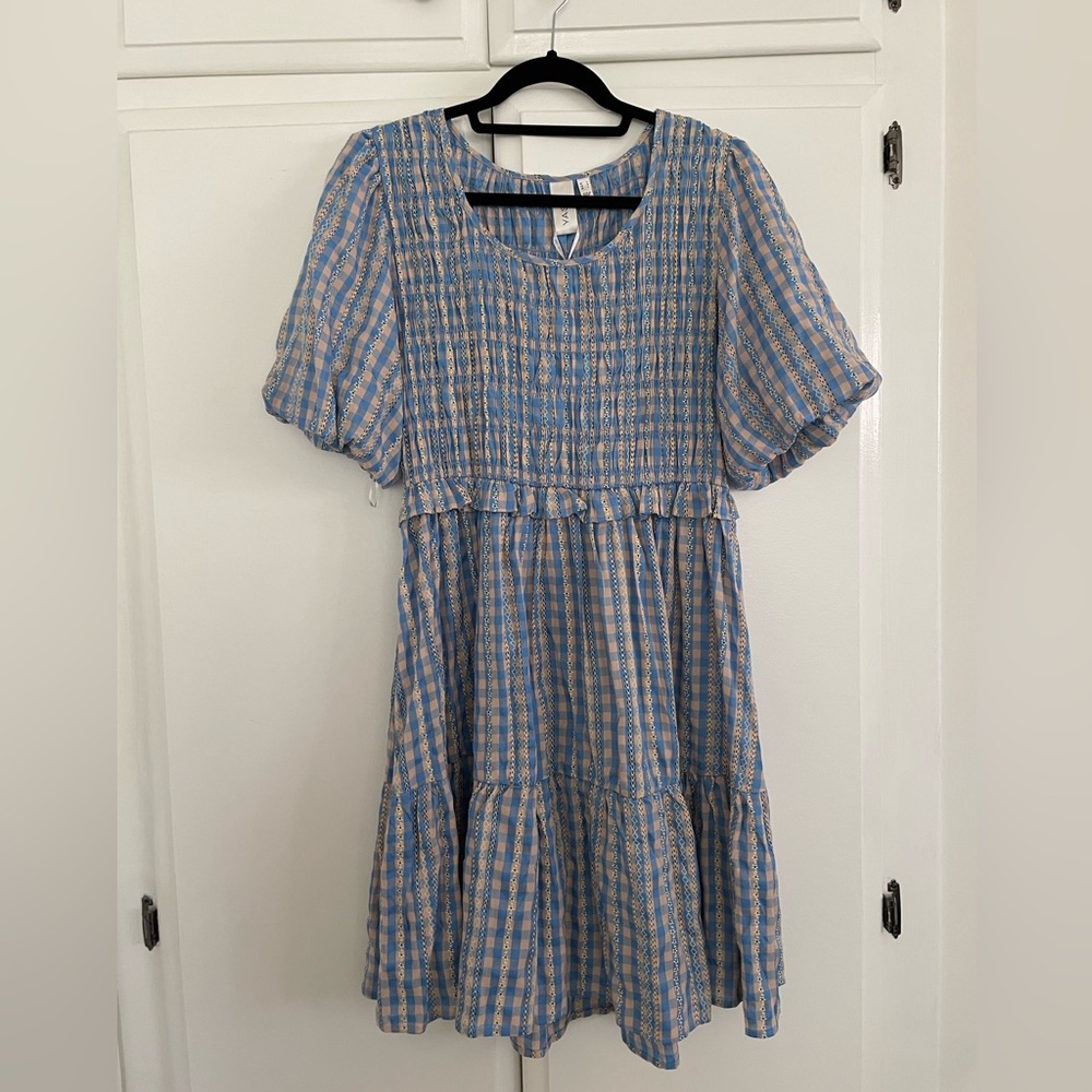 Brand new dress in checkered light blue and tan. Size large
